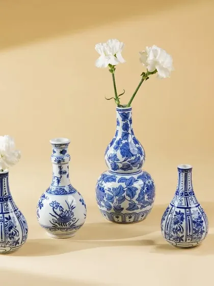 A collection of our product photography for various home decor and tableware brands. These shots display a range of items including placemats, table runners, ceramic bowls, plates, vases, bar tools, and candles, all styled to perfection.