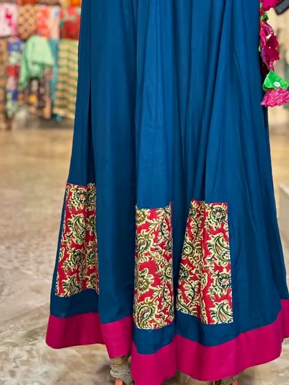 The skirt has beautiful patches of ajrakh print, adding another layer of detail.