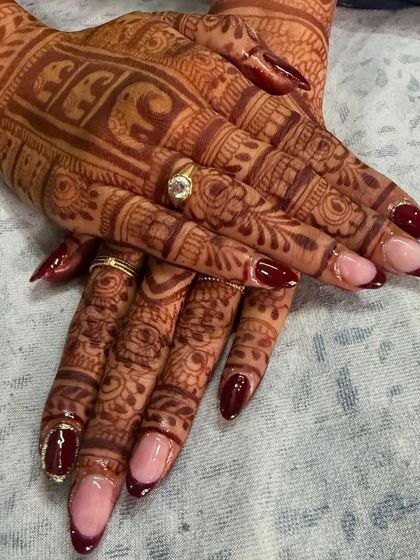 Another view of this stunning bridal set, showcasing how the almond-shaped nails elongate the fingers and create a very graceful look.