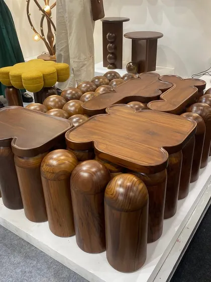 A collectible 'puzzle' coffee table by Studio Indigene. The piece is composed of numerous individual wooden elements, showcasing a playful approach to furniture design and a mastery of woodworking.