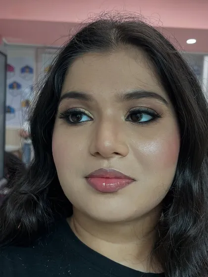 A three-quarter view of the soft glam demo, highlighting the seamless blush and contour application.