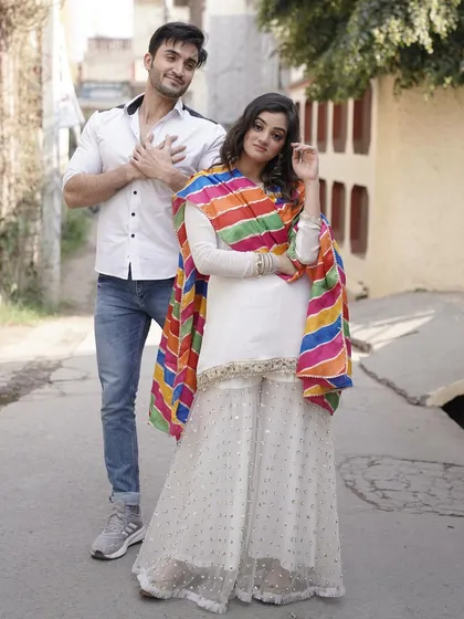 A fun, candid shot with my co-star from the "Delhi Punjab" music video. A positive and collaborative atmosphere on set is important to me.