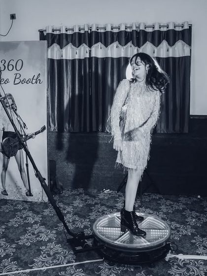 A 360-degree video booth set up at the Taylor Swift themed party. This modern photo op creates amazing, dynamic video clips for guests to share.