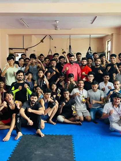 The strength of our club is our team. This is a moment of celebration with the entire squad after the Knockout Inter-Club MMA & Grappling Championship. We train hard together and we win together.