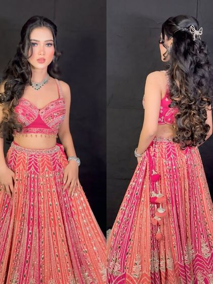 A front and back view of a beautiful half-updo with long, flowing curls.