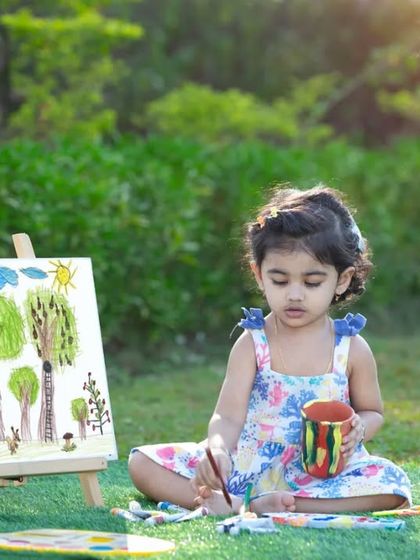 Lost in a world of color and creativity. I love capturing these moments of quiet focus during my painting-themed shoots for toddlers.