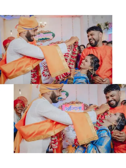 A fun and playful moment during the garland exchange ceremony, showing the lighter side of wedding rituals.