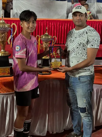 Our player Shubhangi Subba receiving the Best Player award at the YMSC Cup 2024.