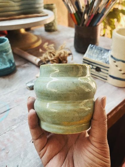 This student took to pottery like a fish to water. In her advanced course, she created this massive, beautiful planter, a real achievement that shows her dedication and skill. I am so proud of her.