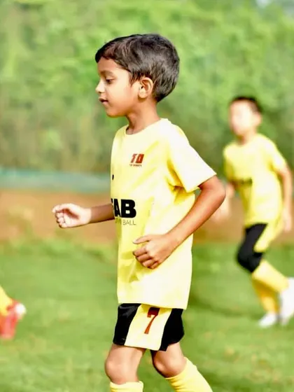 A young player focused during a game. We nurture well-rounded athletes by focusing on individualized development.
