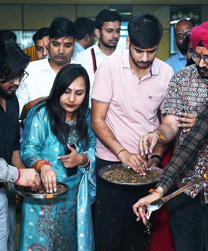 Our team participating in the pooja ceremony for our new office. We believe in starting new chapters with intention and traditional values.