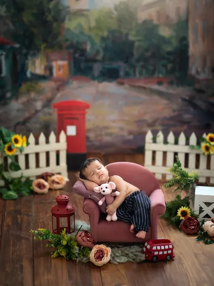 A peaceful nap on a miniature sofa, set against a charming village street backdrop. This setup creates a story of quiet, dreamy afternoons.