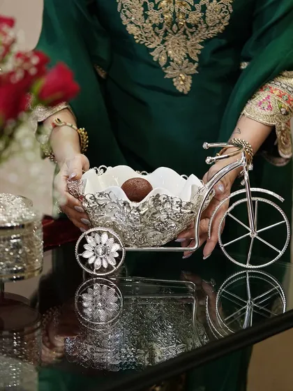 Festive innovation at its finest. My unique cycle-shaped serving bowl adds a whimsical charm to your celebrations, blending luxury with a touch of creative fun.