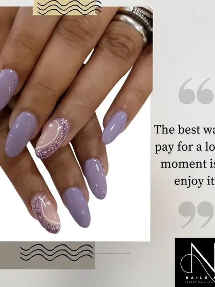 A chic and modern set in a muted lavender. The design is elevated by an accent nail with a sheer base and a curved line of pink glitter.