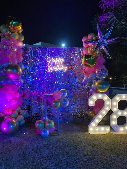 The complete outdoor setup for the 28th birthday, perfect for an evening celebration in a garden or on a terrace.