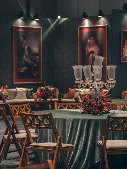 A wide shot of the hall, showcasing the scale of the event and the cohesive design that ties all the different zones together.