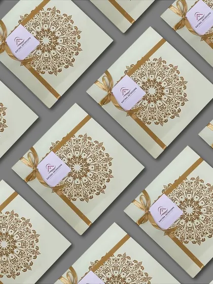 An elegant festive hamper designed for Safina Interiors. The gold mandala-print box with a delicate ribbon and custom tag creates a look of refined celebration.
