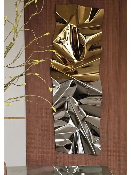 A gold and chrome sculpture I created for a client, seen here in a beautifully styled interior by Basileaf.