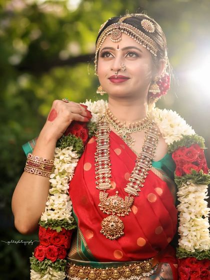 A beautiful Iyengar bride look, complete with traditional temple jewelry and flower garlands. These shots are perfect for a bridal portfolio, showcasing the complete look from makeup to attire.