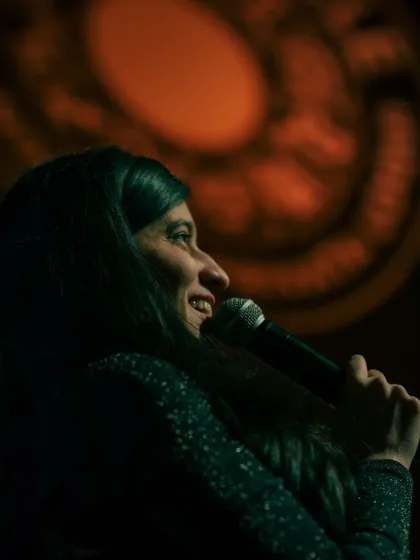 A candid shot from the stage. The joy and focus of performing, even when I can't see the audience, is what I live for.