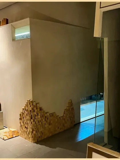 A detail shot of the wooden block feature wall in my office. This element demonstrates an innovative approach to materials, adding texture and a sculptural quality to the interior.