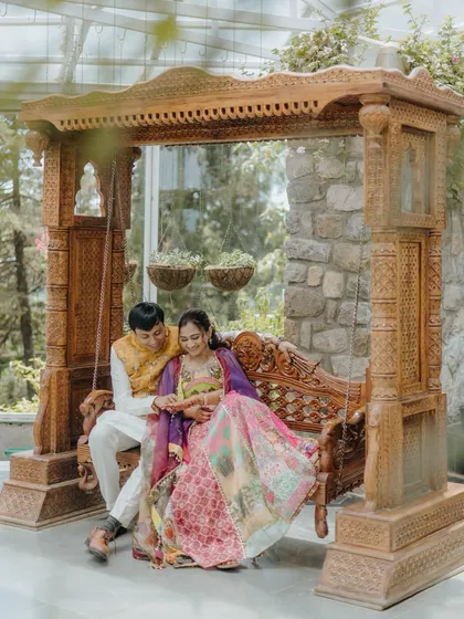 A quiet moment during a vibrant Mehendi ceremony in Mussoorie. We use the beautiful surroundings and natural light to frame the couple, capturing the calm and love amidst the celebration.