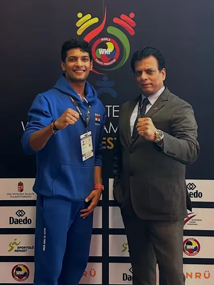 With Pranay at a WKF event. We travel the world together, not just as father and son, but as two generations of Indian karateka dedicated to the sport.