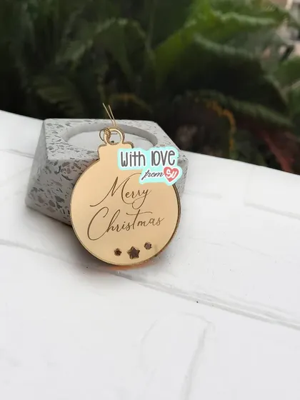 This is my classic bauble-shaped Christmas ornament. The clean design and beautiful script make it a timeless piece that you can use year after year on gifts or as part of your holiday decor.