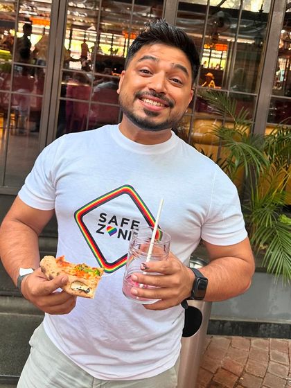 Ankur enjoying a snack and a drink. We are our own best customers because we truly love the food we make.