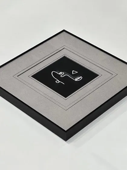 A full view of the double black-core mat design. This technique adds a sophisticated, architectural element to the framing, making it a piece of art in itself.