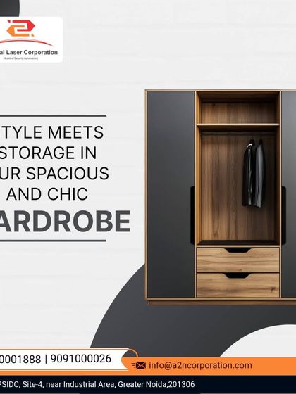 A chic and modern wardrobe design combining dark grey panels with a natural wood-finish section. The recessed handles on the drawers and the open hanging space create a minimalist look that offers both style and practical storage.