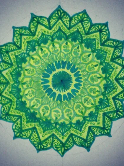 A mandala created with refreshing shades of green and yellow. This piece was designed to feel organic and lively, with patterns that evoke the feeling of leaves and petals unfolding from the center.
