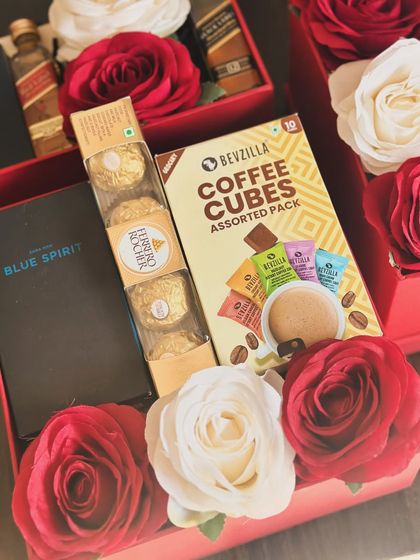 A great gift for the coffee-loving man. This Valentine's box includes assorted coffee cubes from Bevzilla, a Zara mini perfume, and Ferrero Rocher.