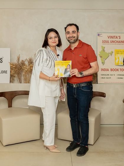 A proud moment for an author and a fan, holding a newly launched book. We capture these key memories for you to share.