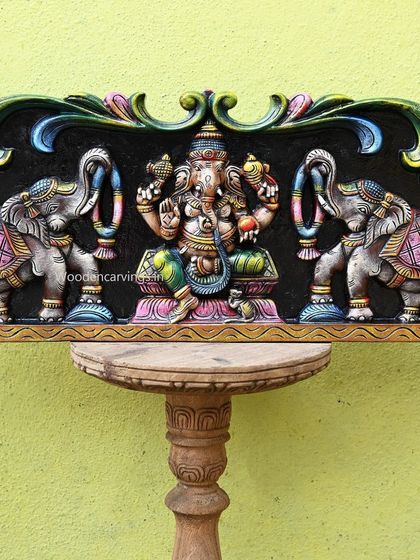 The Gaja Ganesh panel on its own, showcasing the central deity flanked by two elephants against a contrasting black background.