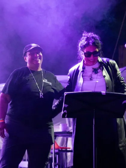 Sharing the stage with another performer at SummerStage. The collaborative and supportive vibe among the artists is a key part of the event's success.