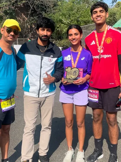 With a family of runners. It's wonderful to see parents and children sharing a passion for fitness and participating in events together.