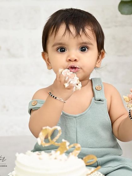A close-up of the sweet taste of birthday cake. These detailed shots help you remember every little part of this special milestone, from the tiny fingers to the frosting on the nose.