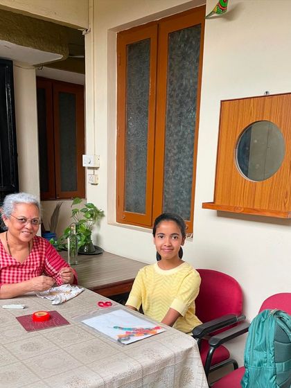 A quiet moment between teacher and student. I believe in providing personalized, step-by-step help to nurture each person's creative journey.