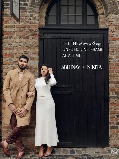 Let the love story unfold, one frame at a time in London. We styled this couple in chic, coordinated trench coats against a rustic brick wall, creating a timeless and romantic pre-wedding look.