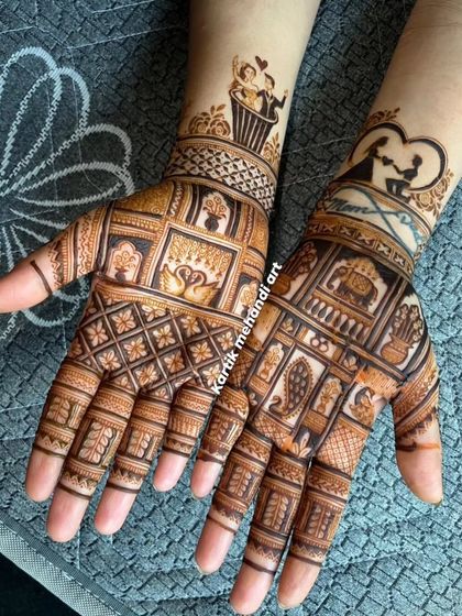 Another creative engagement design, this one featuring a couple figurine and other personal symbols woven into a traditional grid pattern.