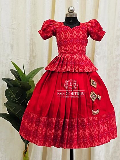 A single view of the red Ikat lehenga, which can be made in multiple sizes for twinning.