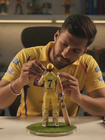 A unique piece showing me adding the final touches to a custom-made MS Dhoni figurine. This combines my love for art and cricket with digital tools to imagine new forms of collectibles.