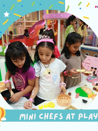 Mini chefs at play. Our pretend kitchen is a hub of activity, where kids cook up imaginary feasts.