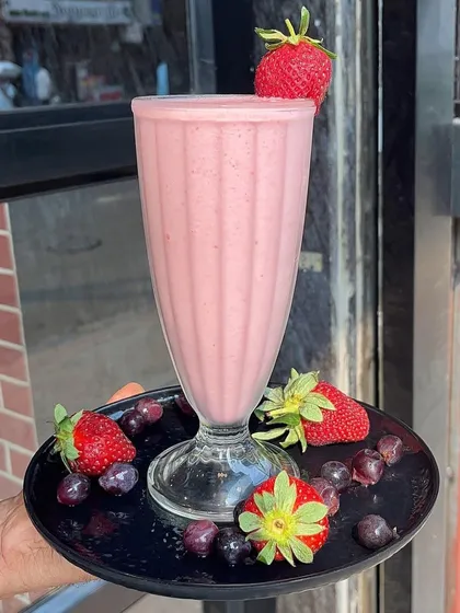 Beat the heat with my summer special strawberry and grape milkshake. It's a refreshing and delicious treat.