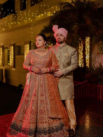 The beautiful couple on their special day. My client looks absolutely regal in her heavily embroidered lehenga, a perfect match for her groom's sherwani.