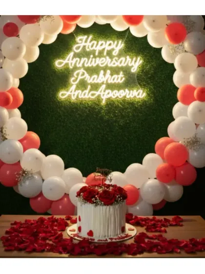 I had the joy of baking my own 7th-anniversary cake this year. This wafer paper cake with a mixed fruit flavor was the centerpiece of our celebration, complete with a neon sign and rose petals.
