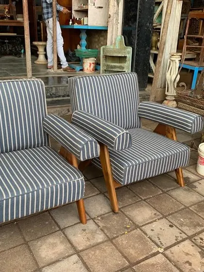 Another angle of the striped V-leg armchairs.