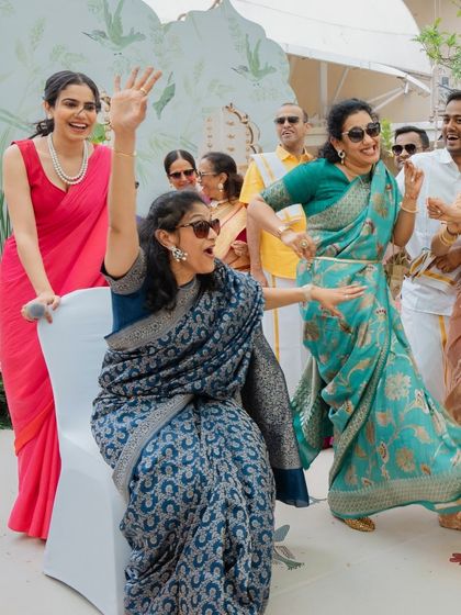 Waving to the crowd and enjoying the moment. It's a joy to see everyone so happy and engaged.