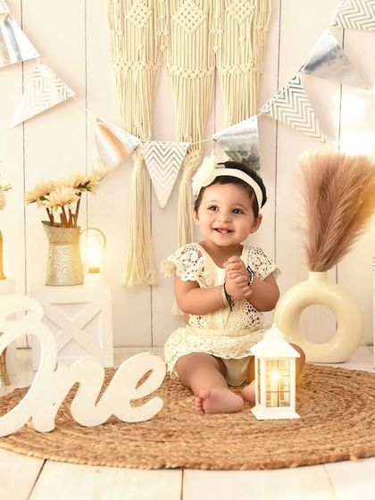 A happy clap for turning one! This bright and airy boho-themed shoot is perfect for capturing the joyful spirit of a first birthday.